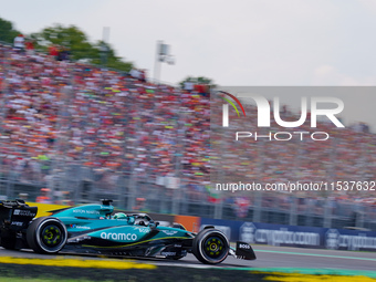 Lance Stroll of Canada drives the (18) Aston Martin Aramco F1 Team AMR24 during the Race of the Formula 1 Pirelli Gran Premio d'Italia 2024...