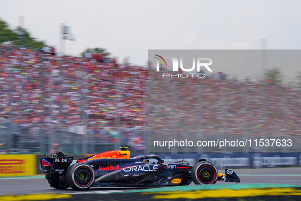 Sergio Perez of Mexico drives the (11) Oracle Red Bull Racing RB20 during the Race of the Formula 1 Pirelli Gran Premio d'Italia 2024 in Mon...