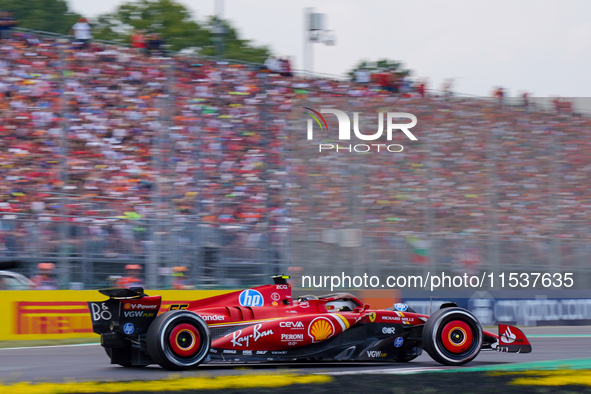 Carlos Sainz of Spain drives the (55) Scuderia Ferrari SF-24 during the Race of the Formula 1 Pirelli Gran Premio d'Italia 2024 in Monza, It...