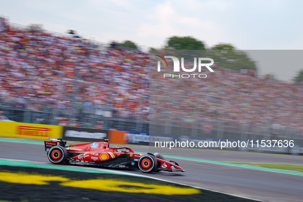 Carlos Sainz of Spain drives the (55) Scuderia Ferrari SF-24 during the Race of the Formula 1 Pirelli Gran Premio d'Italia 2024 in Monza, It...