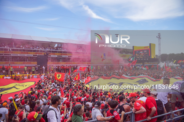 Ferrari fans stand under the podium during the Formula 1 Pirelli Gran Premio d'Italia 2024 in Monza, Italy, on September 1, 2024. 