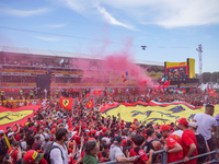 Ferrari fans stand under the podium during the Formula 1 Pirelli Gran Premio d'Italia 2024 in Monza, Italy, on September 1, 2024. (