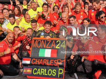 Scuderia Ferrari celebrates the win of the race with Charles Leclerc and Carlos Sainz during the Race of the Formula 1 Pirelli Gran Premio d...