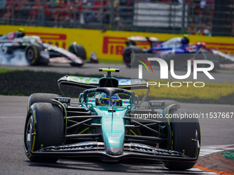 Fernando Alonso of Spain drives the (14) Aston Martin Aramco F1 Team AMR24 during the Race of the Formula 1 Pirelli Gran Premio d'Italia 202...