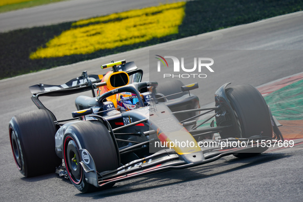 Sergio Perez of Mexico drives the (11) Oracle Red Bull Racing RB20 during the Race of the Formula 1 Pirelli Gran Premio d'Italia 2024 in Mon...