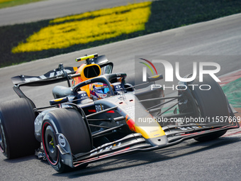 Sergio Perez of Mexico drives the (11) Oracle Red Bull Racing RB20 during the Race of the Formula 1 Pirelli Gran Premio d'Italia 2024 in Mon...