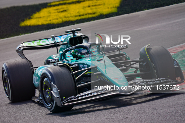 Lance Stroll of Canada drives the (18) Aston Martin Aramco F1 Team AMR24 during the Race of the Formula 1 Pirelli Gran Premio d'Italia 2024...