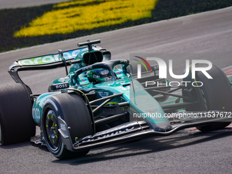 Lance Stroll of Canada drives the (18) Aston Martin Aramco F1 Team AMR24 during the Race of the Formula 1 Pirelli Gran Premio d'Italia 2024...