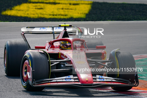 Carlos Sainz of Spain drives the (55) Scuderia Ferrari SF-24 during the Race of the Formula 1 Pirelli Gran Premio d'Italia 2024 in Monza, It...