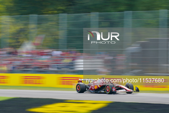 Carlos Sainz of Spain drives the (55) Scuderia Ferrari SF-24 during the Race of the Formula 1 Pirelli Gran Premio d'Italia 2024 in Monza, It...