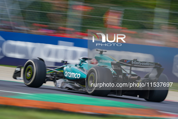 Lance Stroll of Canada drives the (18) Aston Martin Aramco F1 Team AMR24 during the Race of the Formula 1 Pirelli Gran Premio d'Italia 2024...