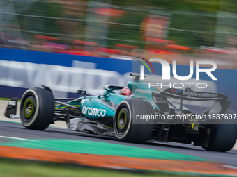 Lance Stroll of Canada drives the (18) Aston Martin Aramco F1 Team AMR24 during the Race of the Formula 1 Pirelli Gran Premio d'Italia 2024...