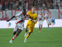 Davis Mensah of Mantova 1911 contrasts with Tijs Velthius of US Salernitana 1919 during the Italian Serie B soccer championship football mat...