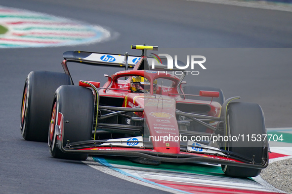 Carlos Sainz of Spain drives the (55) Scuderia Ferrari SF-24 during the Race of the Formula 1 Pirelli Gran Premio d'Italia 2024 in Monza, It...