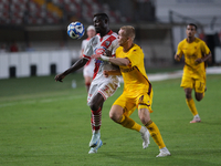 Davis Mensah of Mantova 1911 contrasts with Tijs Velthius of US Salernitana 1919 during the Italian Serie B soccer championship football mat...