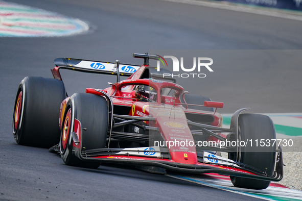 Charles Leclerc of Monaco drives the (16) Scuderia Ferrari SF-24 during the Race of the Formula 1 Pirelli Gran Premio d'Italia 2024 in Monza...