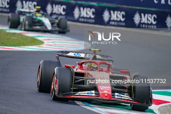 Carlos Sainz of Spain drives the (55) Scuderia Ferrari SF-24 during the Race of the Formula 1 Pirelli Gran Premio d'Italia 2024 in Monza, It...