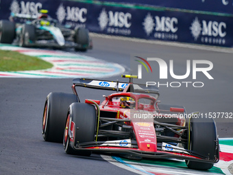 Carlos Sainz of Spain drives the (55) Scuderia Ferrari SF-24 during the Race of the Formula 1 Pirelli Gran Premio d'Italia 2024 in Monza, It...