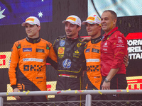 Charles Leclerc, Oscar Piastri, and Lando Norris stand on the podium during the Race of the Formula 1 Pirelli Gran Premio d'Italia 2024 in M...