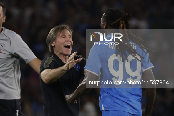 Gabriele Oriali of Napoli and Frank Zambo Anguissa of Napoli celebrate after scoring their second goal during the Serie A soccer match SSC N...