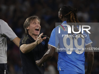 Gabriele Oriali of Napoli and Frank Zambo Anguissa of Napoli celebrate after scoring their second goal during the Serie A soccer match SSC N...