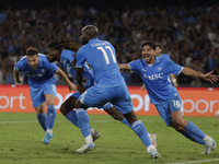 Frank Zambo Anguissa of Napoli celebrates after scoring their second goal during the Serie A soccer match between SSC Napoli and Parma Calci...