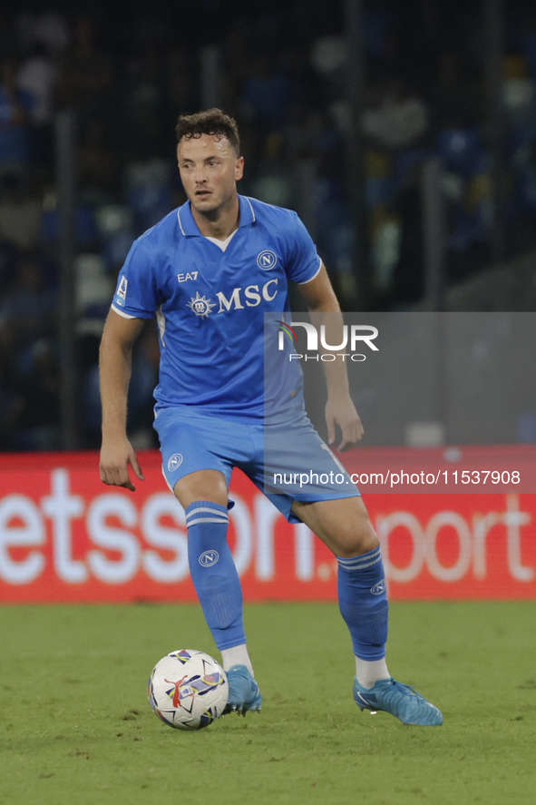 Amir Rrahmani of Napoli controls the ball during the Serie A soccer match between SSC Napoli and Parma Calcio at Stadio Maradona in Naples,...