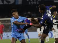 Parma's Zion Suzuki and David Neres of Napoli are seen in action during the Serie A soccer match SSC Napoli - Parma Calcio at Stadio Maradon...