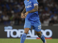 Giovanni Di Lorenzo of Napoli controls the ball during the Serie A soccer match between SSC Napoli and Parma Calcio at Stadio Maradona in Na...