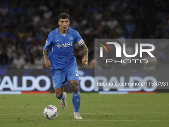 Giovanni Di Lorenzo of Napoli controls the ball during the Serie A soccer match between SSC Napoli and Parma Calcio at Stadio Maradona in Na...