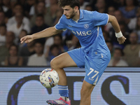 Khvicha Kvaratskhelia of Napoli controls the ball during the Serie A soccer match SSC Napoli vs. Parma Calcio at Stadio Maradona in Naples,...