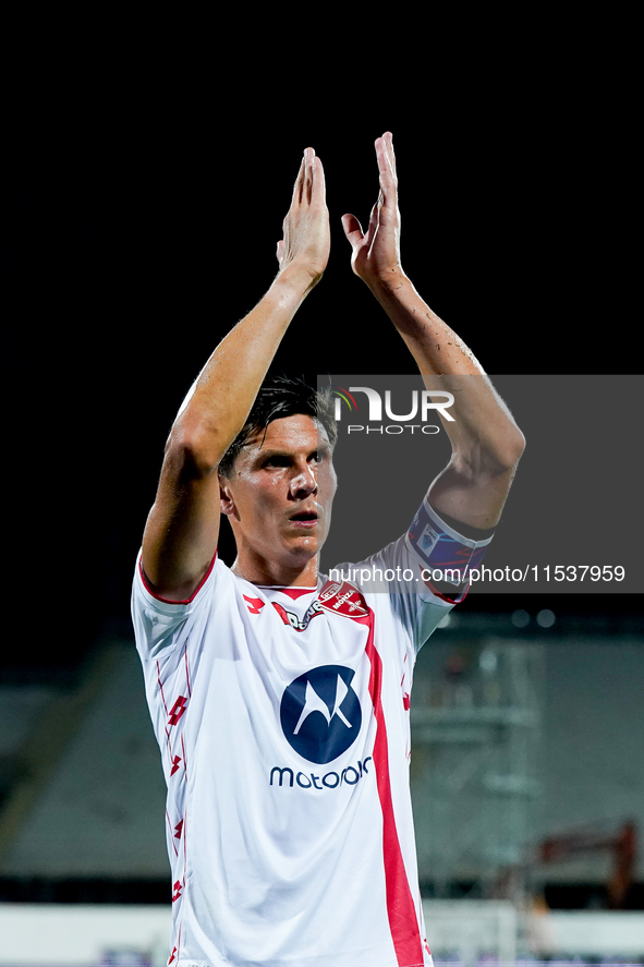 Matteo Pessina of AC Monza greets his supporters during the Serie A Enilive match between ACF Fiorentina and AC Monza at Stadio Artemio Fran...