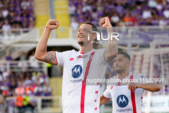 Milan Djuric of AC Monza celebrates after scoring first goal during the Serie A Enilive match between ACF Fiorentina and AC Monza at Stadio...