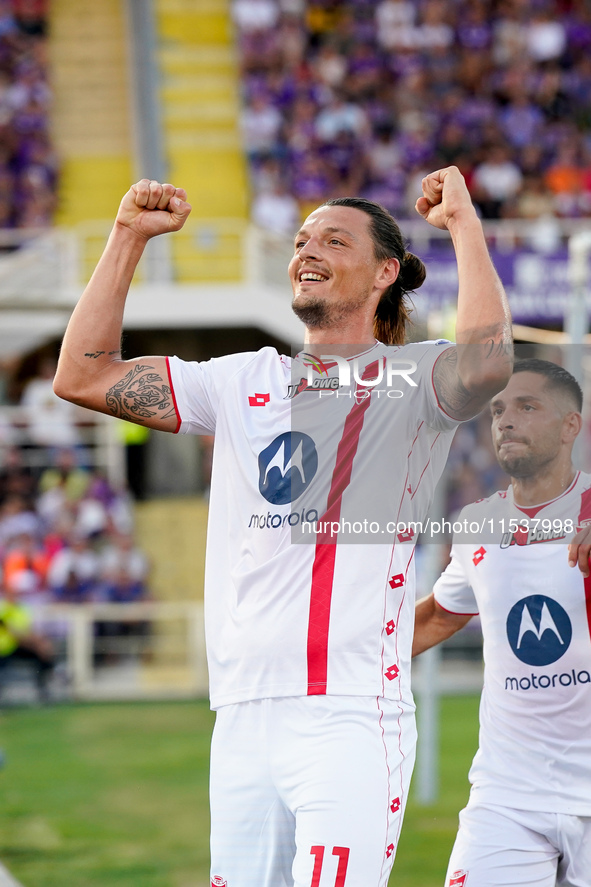 Milan Djuric of AC Monza celebrates after scoring first goal during the Serie A Enilive match between ACF Fiorentina and AC Monza at Stadio...