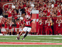 Wisconsin Badgers kicker Gavin Lahm #97 performs the opening kickoff at Camp Randall Stadium in Madison, Wisconsin, on August 30, 2024. (