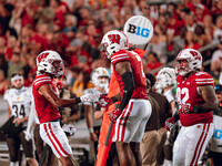 Wisconsin Badgers linebacker Jaheim Thomas #7 celebrates a defensive stop against the Western Michigan Broncos at Camp Randall Stadium in Ma...