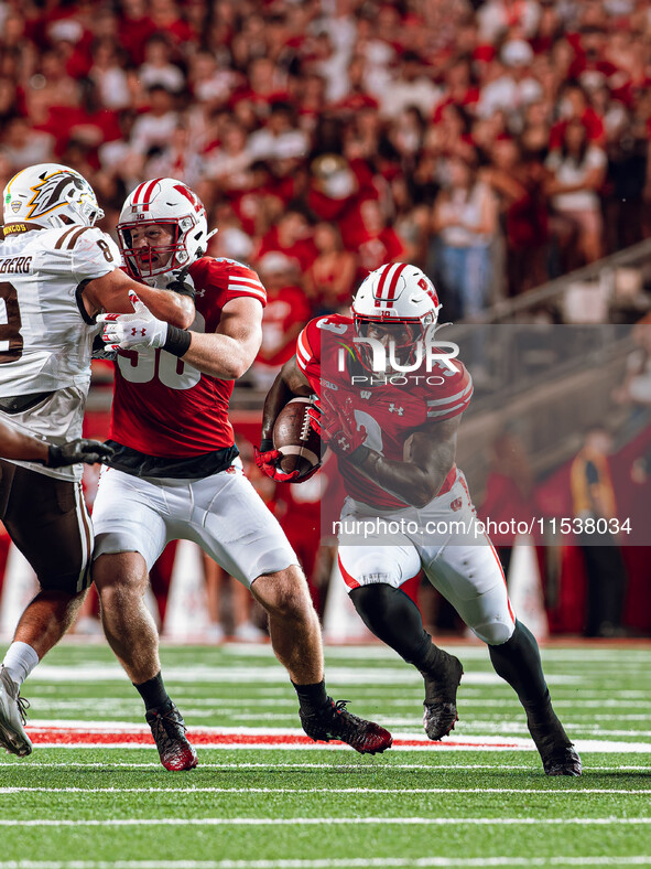 Wisconsin Badgers running back Tawee Walker #3 finds a gap against Western Michigan Broncos at Camp Randall Stadium in Madison, Wisconsin, o...