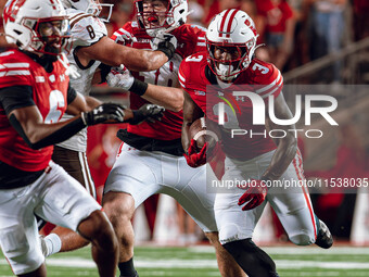 Wisconsin Badgers running back Tawee Walker #3 finds a gap against Western Michigan Broncos at Camp Randall Stadium in Madison, Wisconsin, o...