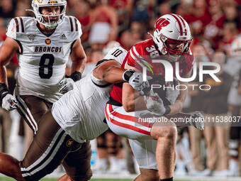 Wisconsin Badgers tight end Tucker Ashcraft #38 runs down the field after a catch against the Western Michigan Broncos at Camp Randall Stadi...