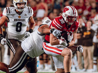 Wisconsin Badgers tight end Tucker Ashcraft #38 runs down the field after a catch against the Western Michigan Broncos at Camp Randall Stadi...