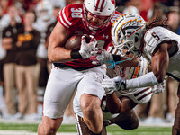 Wisconsin Badgers tight end Tucker Ashcraft #38 runs down the field after a catch against the Western Michigan Broncos at Camp Randall Stadi...