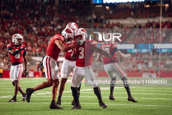 Wisconsin Badgers running back Tawee Walker #3 celebrates a touchdown against the Western Michigan Broncos at Camp Randall Stadium in Madiso...