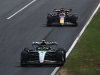 Lewis Hamilton of Mercedes and Max Verstappen of Red Bull Racing during the Formula 1 Italian Grand Prix at Autodromo Nazionale di Monza in...