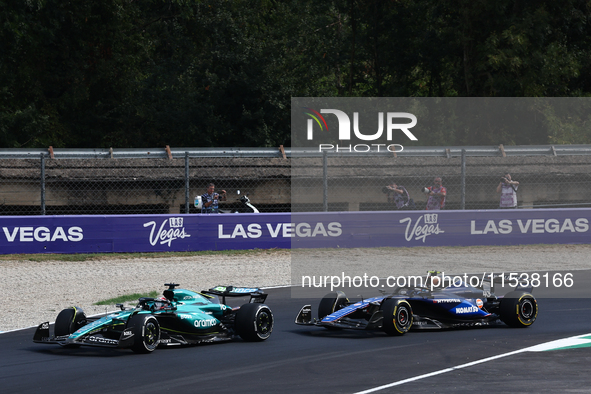 Lance Stroll of Aston Martin Aramco and Franco Colapinto of Williams during the Formula 1 Italian Grand Prix at Autodromo Nazionale di Monza...