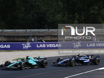 Lance Stroll of Aston Martin Aramco and Franco Colapinto of Williams during the Formula 1 Italian Grand Prix at Autodromo Nazionale di Monza...