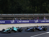 Lance Stroll of Aston Martin Aramco and Franco Colapinto of Williams during the Formula 1 Italian Grand Prix at Autodromo Nazionale di Monza...