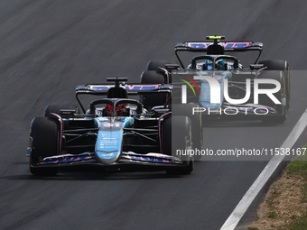 Esteban Ocon and Pierre Gasly of Alpine during the Formula 1 Italian Grand Prix at Autodromo Nazionale di Monza in Monza, Italy on September...