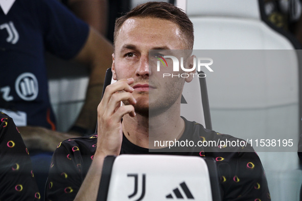 Juventus midfielder Teun Koopmeiners (8) waits on the bench during the Serie A football match number 3 between Juventus and Roma in Turin, P...