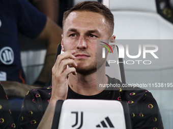 Juventus midfielder Teun Koopmeiners (8) waits on the bench during the Serie A football match number 3 between Juventus and Roma in Turin, P...