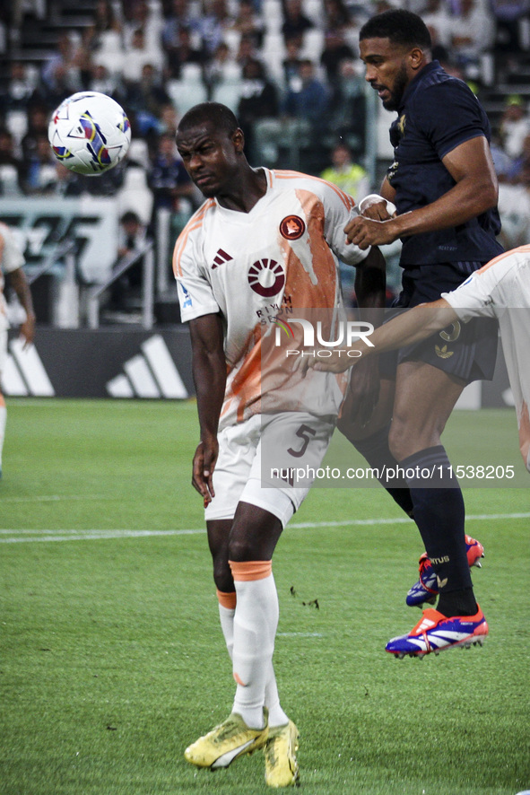 Roma defender Evan N'Dicka (5) and Juventus defender Bremer (3) head the ball during the Serie A football match number 3 between Juventus an...